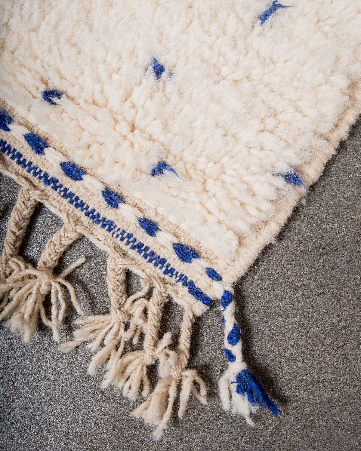 Modern, designer, handcrafted Berber rug from Morocco. Beniourain carpet with beautiful colours and patterns and fluffy wool texture.